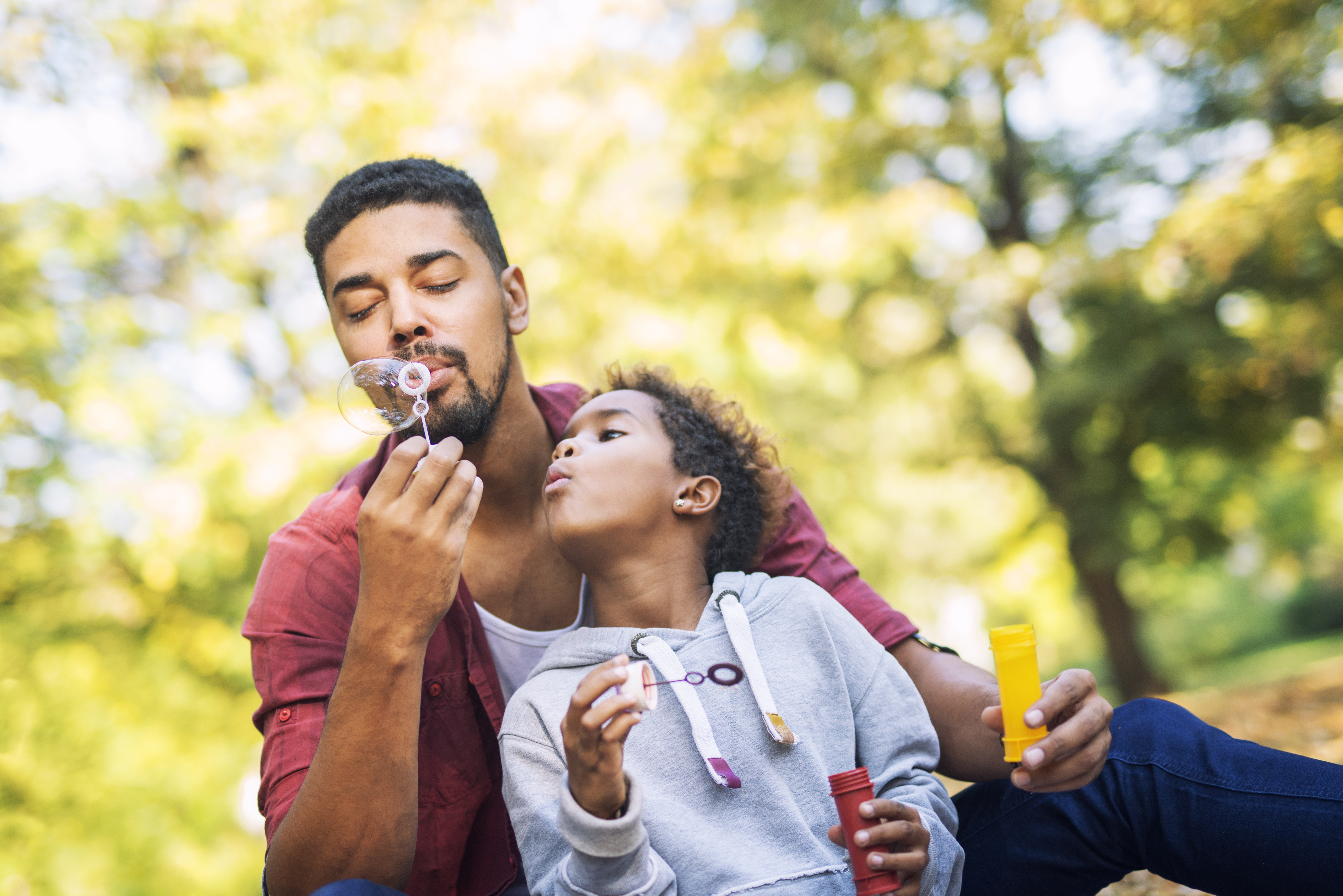 Family Blowing Bubbles