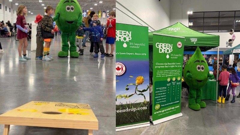Green Drop team members welcoming families and children at the FootStock community.