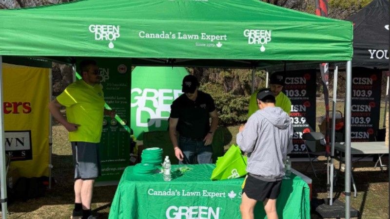 Visitors stopping by the Green Drop booth during the RunWild community event in St. Albert
