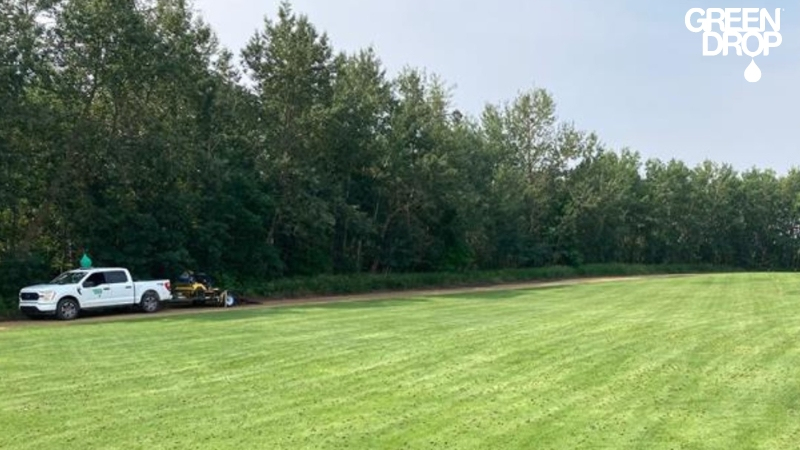 Green Drop truck performing estate management service