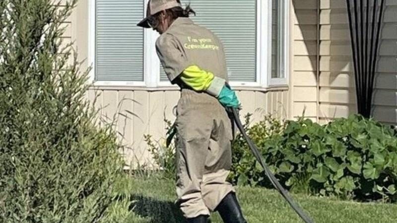 Green Drop technician caring for a Calgary lawn