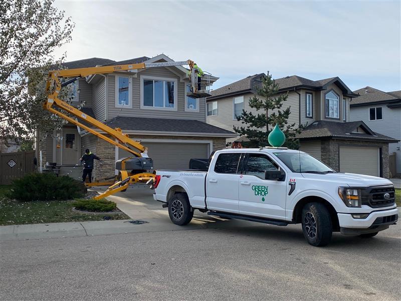 Green Drop Workers Christmas Lights Set Up