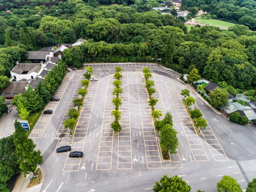 parking lot aerial view with perfectly cleared and controlled vegetation