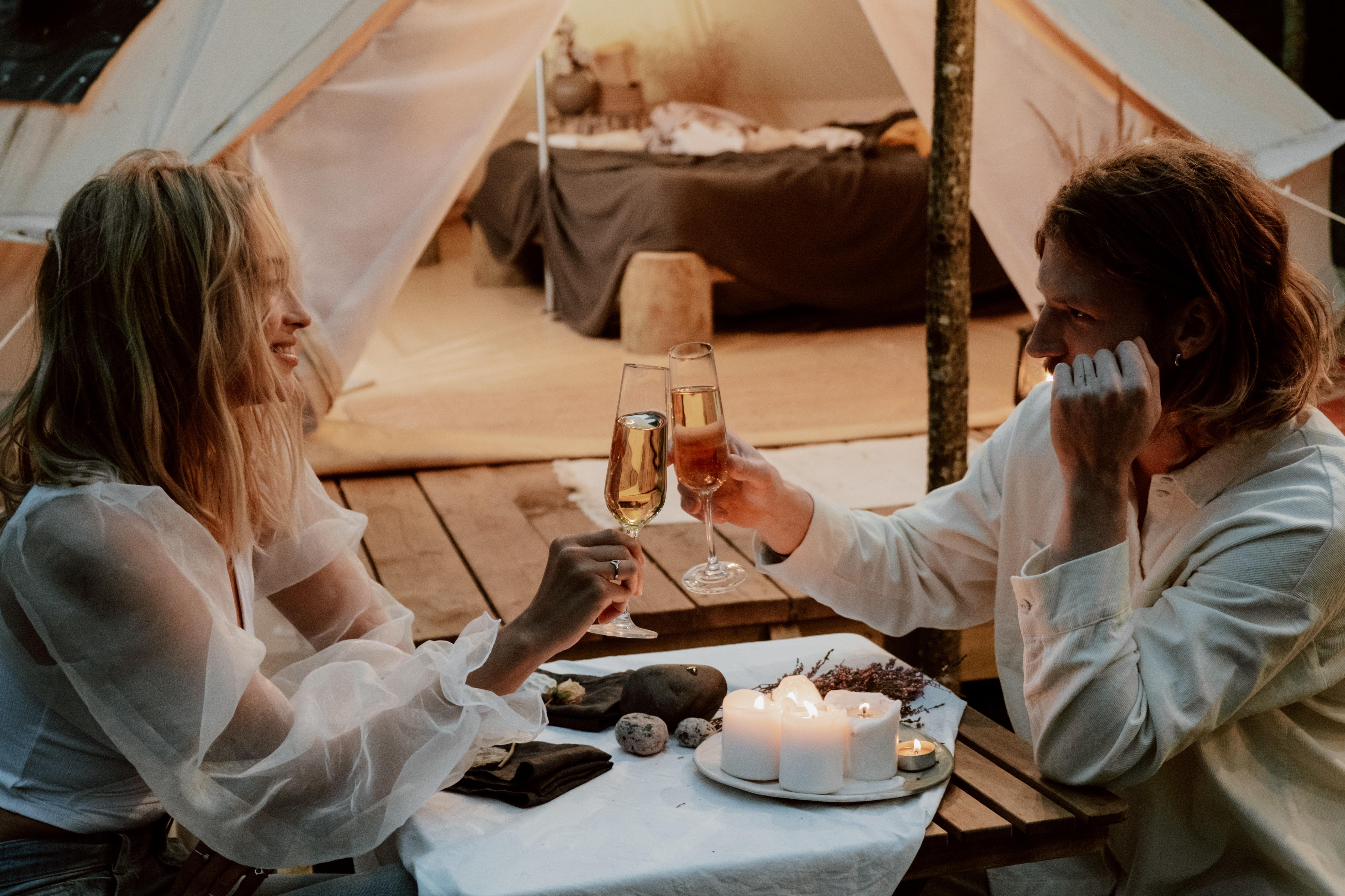 Couple Enjoying Glamping Backyard